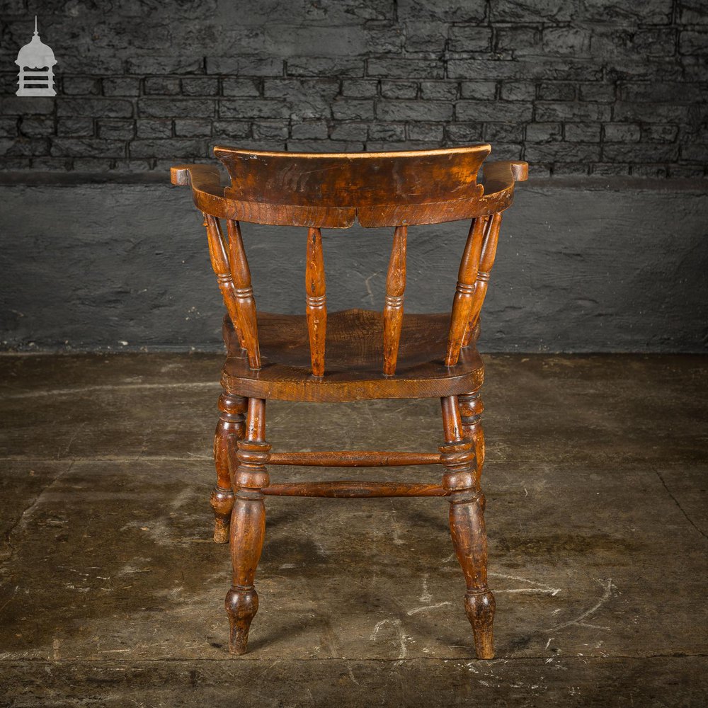 19th C Captain's Bow Seat Smokers Chair with Turned Arm Supports and Double H Stretcher