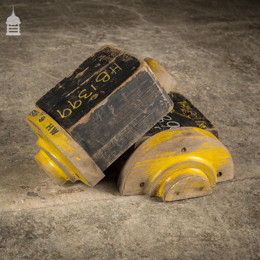 Pair of Black and Yellow Industrial Factory Foundry Moulds