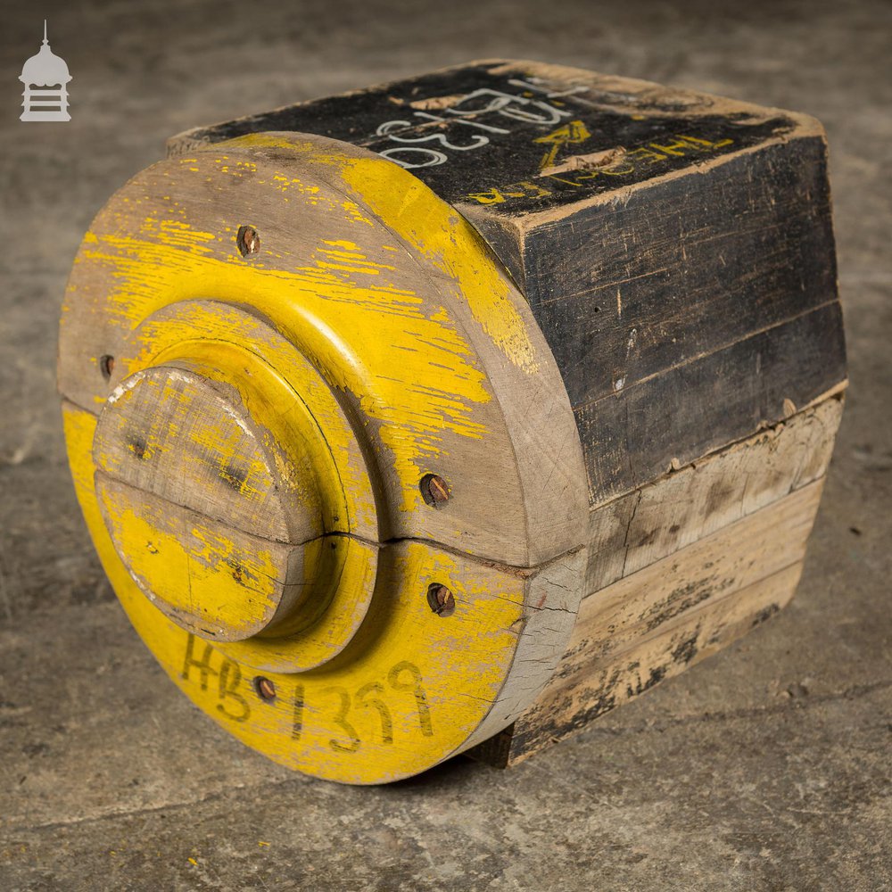 Pair of Black and Yellow Industrial Factory Foundry Moulds