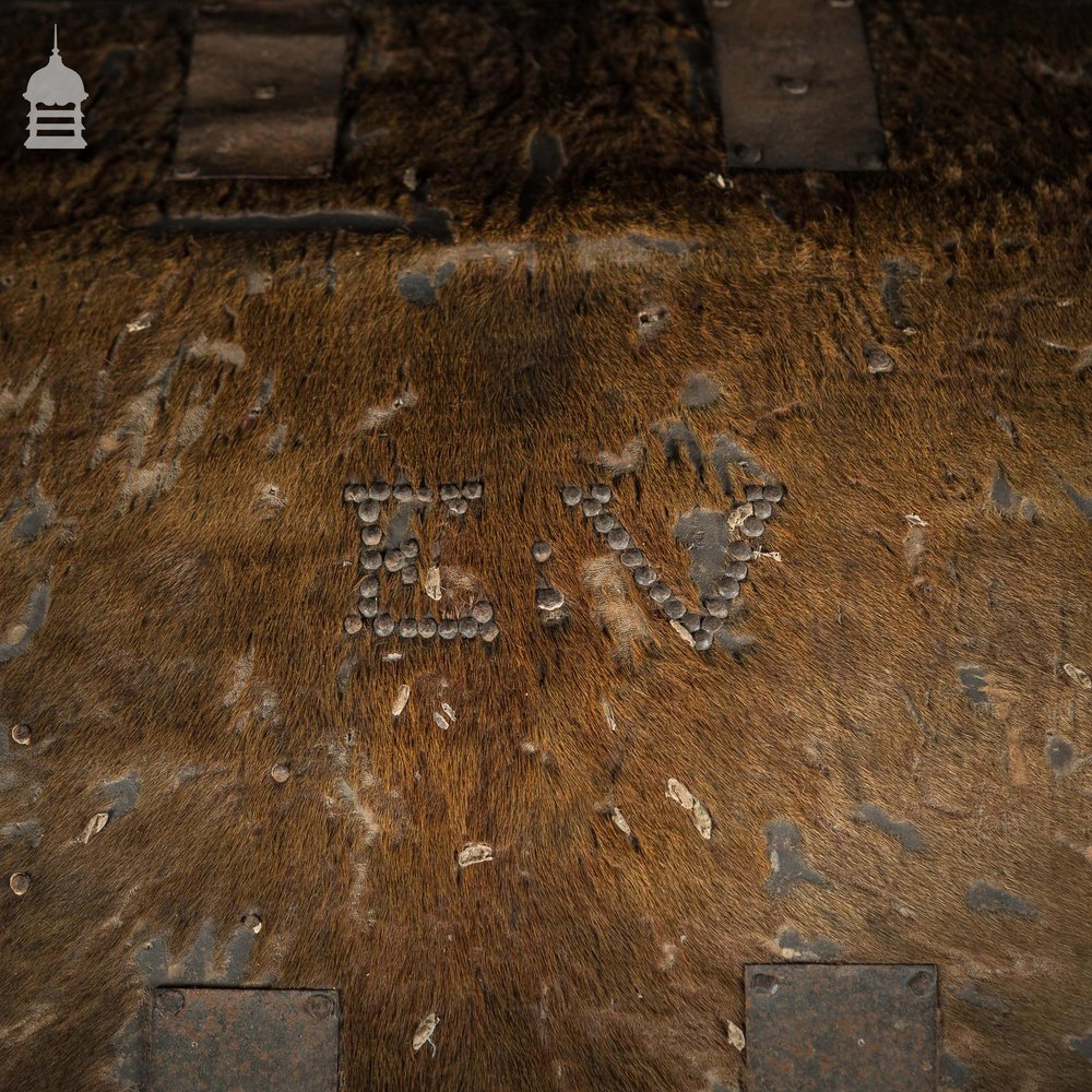 19th C Wooden Trunk covered in Hide with Metal Strapping, Studs and E.V Monogram on Lid