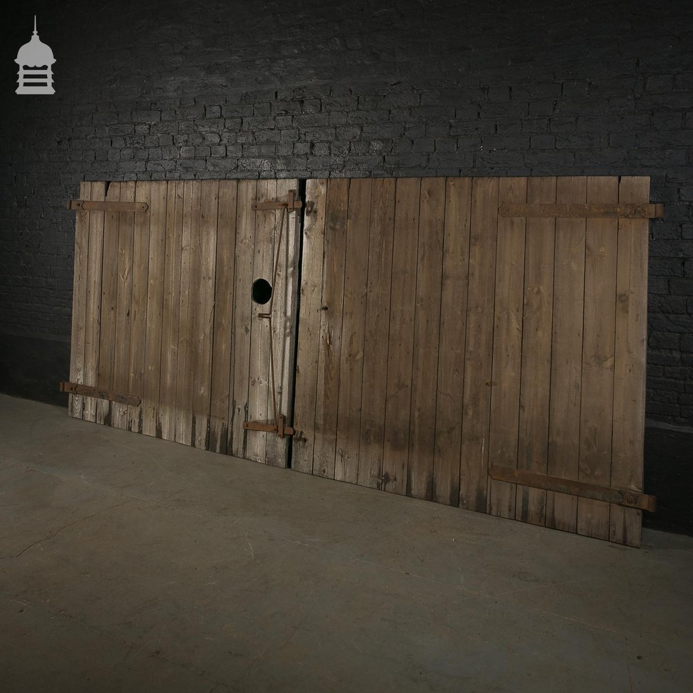 Pair of Reclaimed Pine Ledged and Braced Barn Doors with Double Latch Mechanism