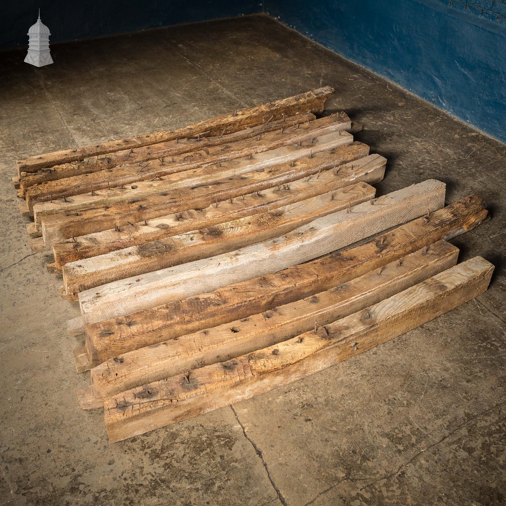 Batch of 11 Reclaimed Arched Short Oak Beams