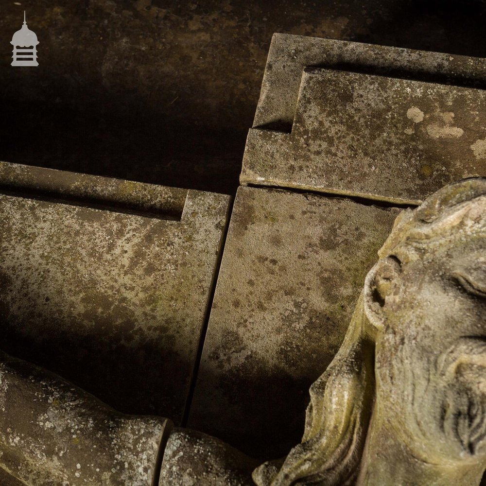 A Life-Sized Jesus On The Cross on a Huge 14ft x 6ft Crucifix Carved In Stone