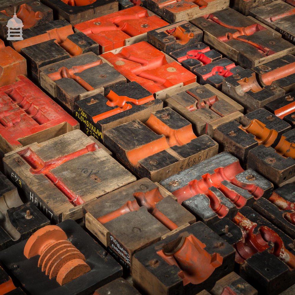 Collection of 60 Black and Red Industrial Factory Foundry Moulds