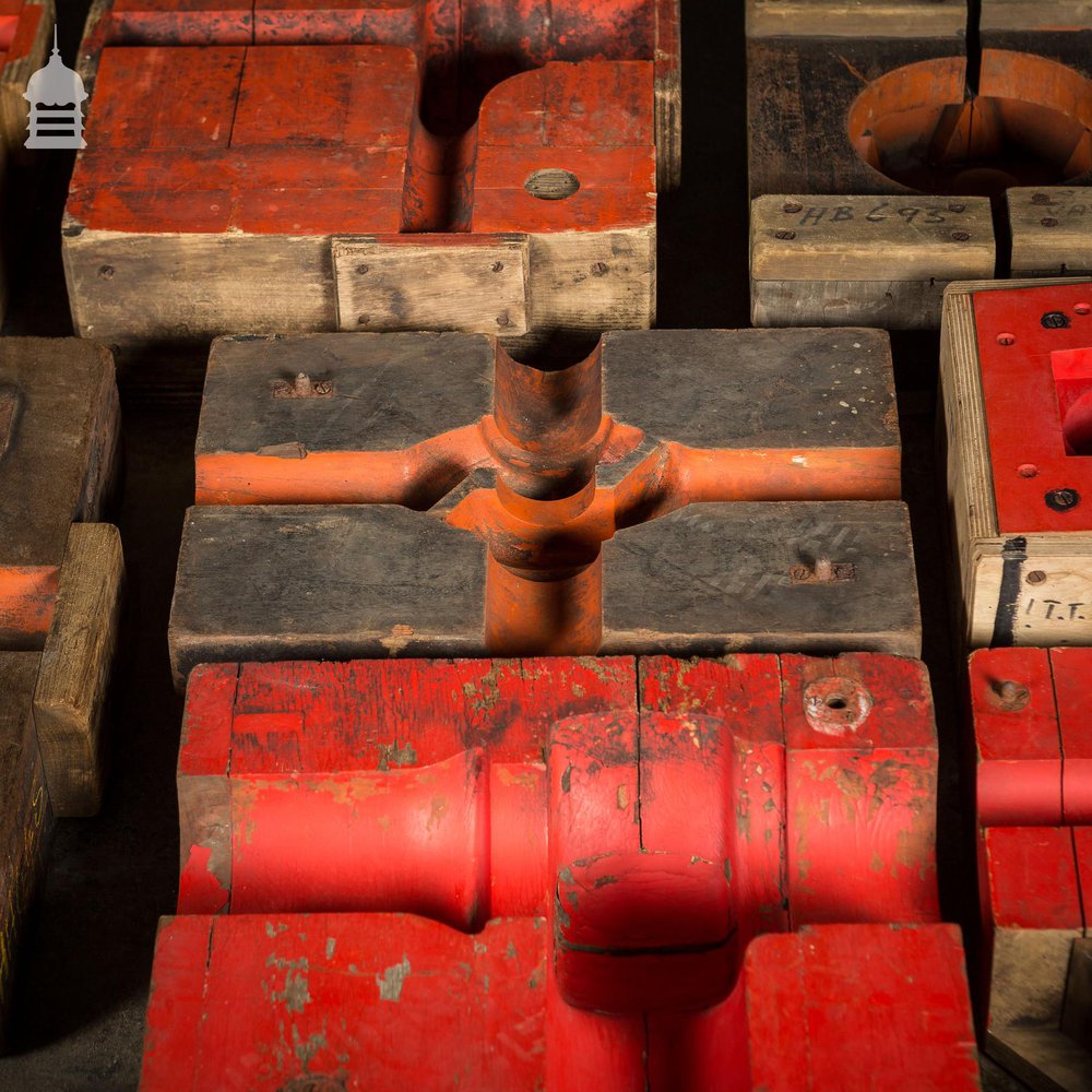 Collection of 18 Red and Black Industrial Factory Moulds