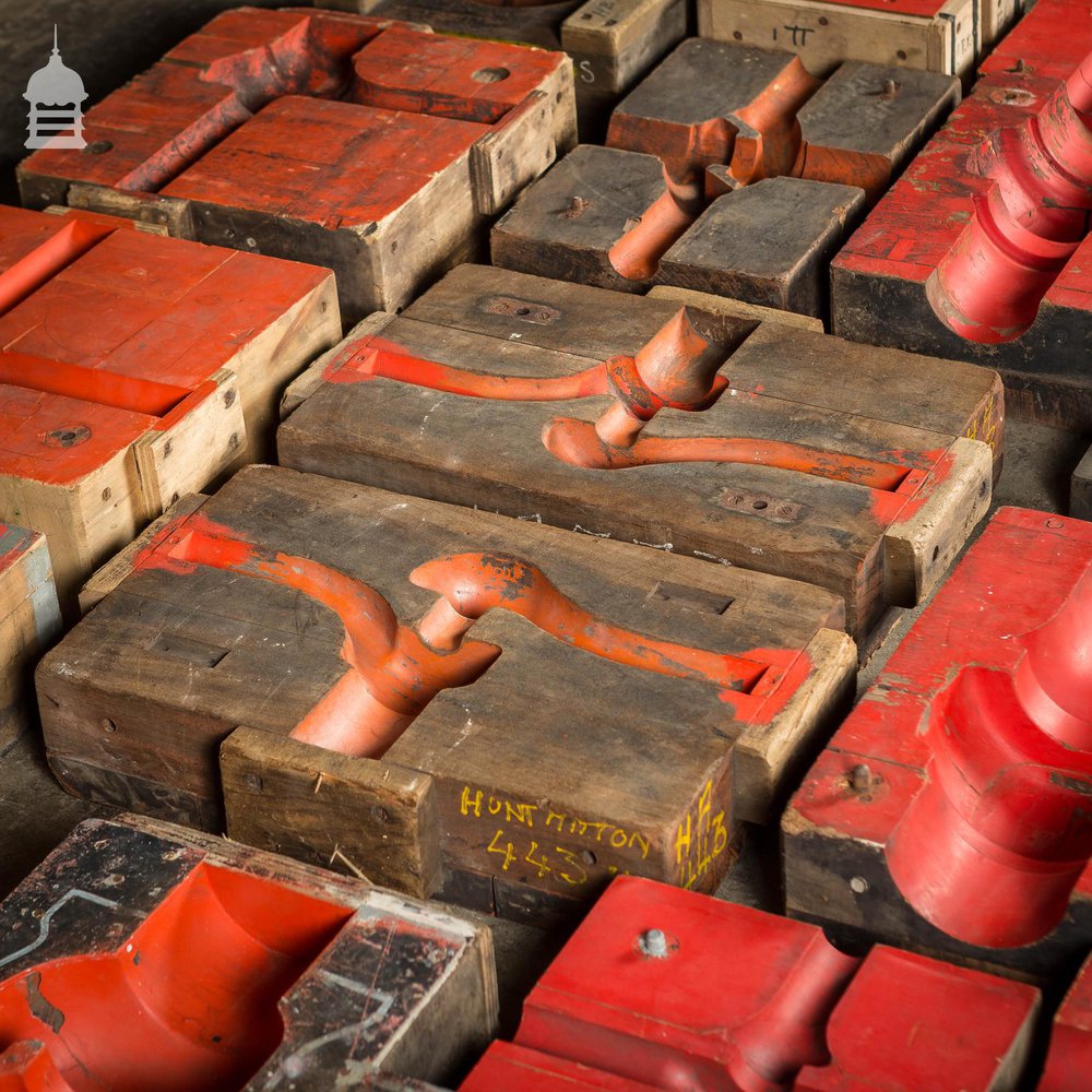 Collection of 18 Red and Black Industrial Factory Moulds