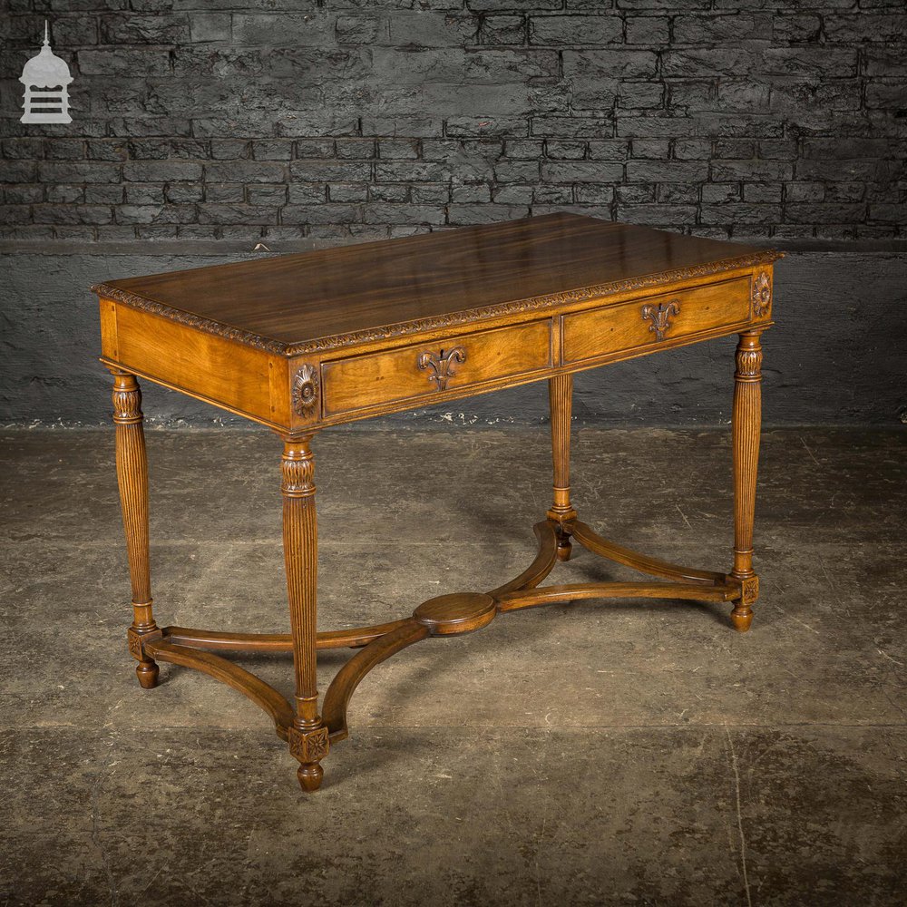 A Fine Late 19th C Sheraton Style Writing Table with Carved Prince of Wales Feathers Escutcheons and Elegant Mellon Fluted Legs.