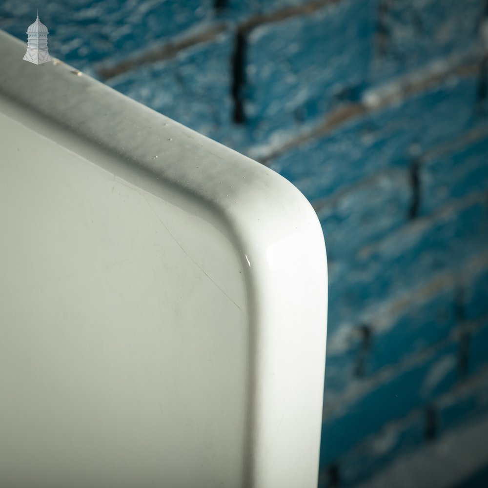 Reclaimed slab urinal backsplash and end panels, white glazed