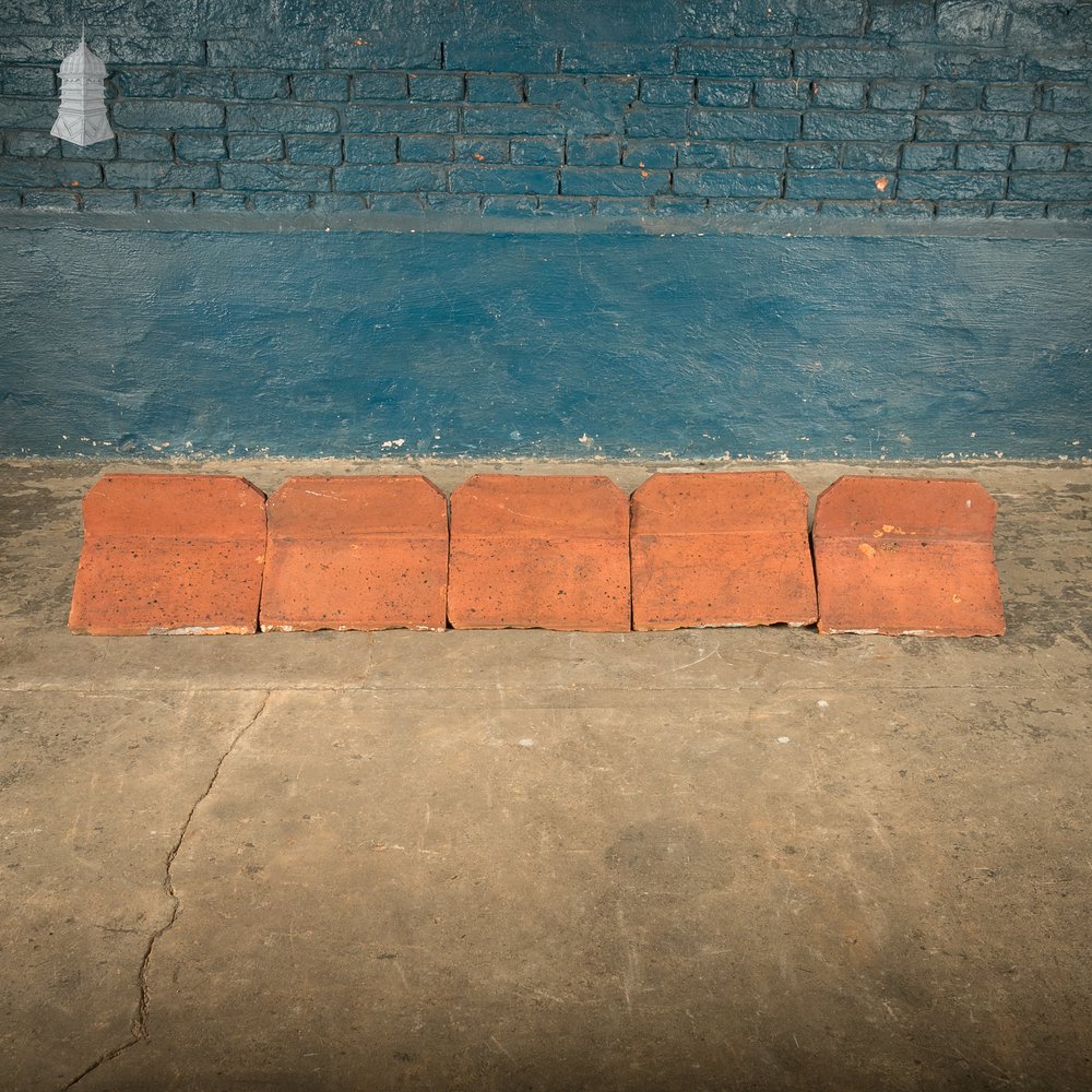 Capped Ridge Tiles, A Batch of 55 Reclaimed Terracotta