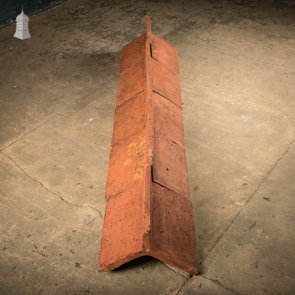 Capped Ridge Tiles, A Batch of 55 Reclaimed Terracotta