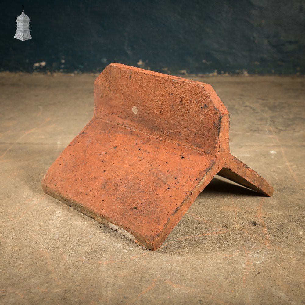 Capped Ridge Tiles, A Batch of 55 Reclaimed Terracotta