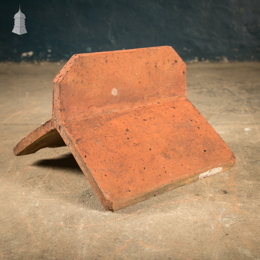 Capped Ridge Tiles, A Batch of 55 Reclaimed Terracotta