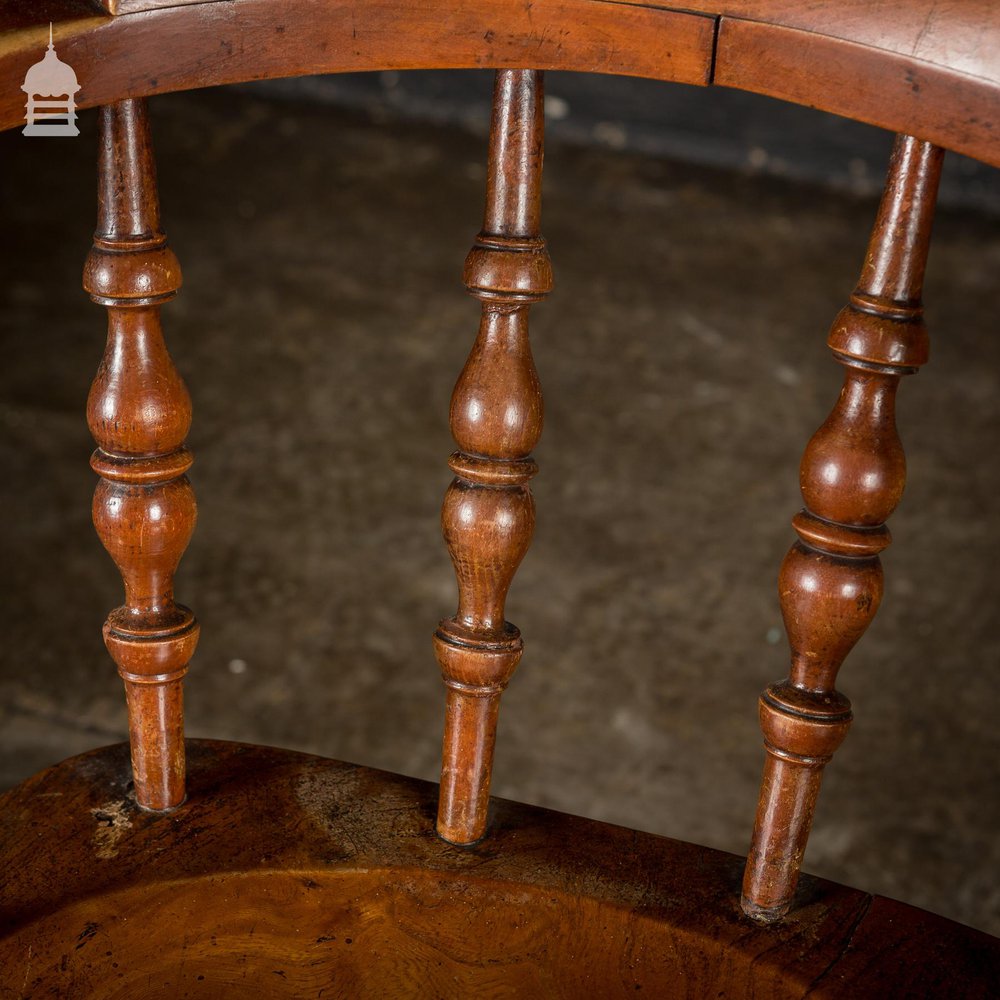 19th C Elm Captains Bow Seat Smokers Chair with Turned Arm Support and Double H Stretcher