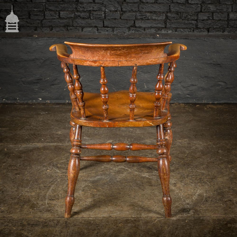 19th C Elm Captains Bow Seat Smokers Chair with Turned Arm Support and Double H Stretcher